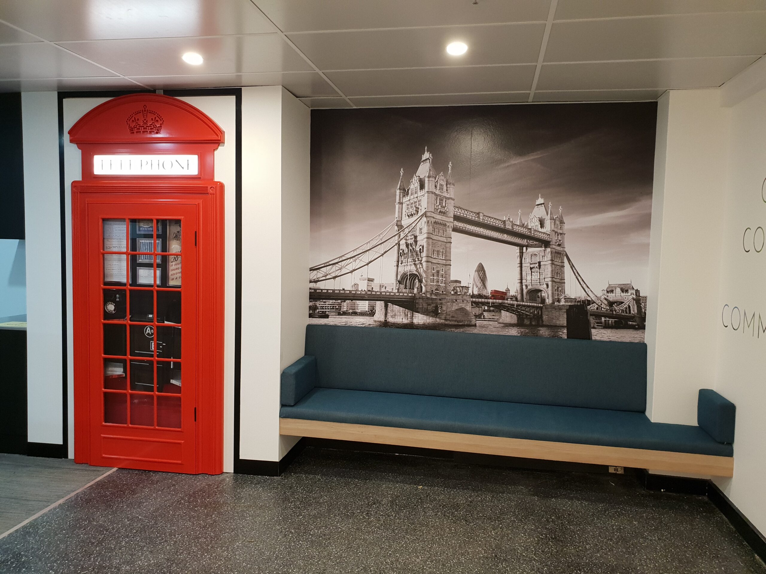 Custom joinery with UK phone booth and bench seat