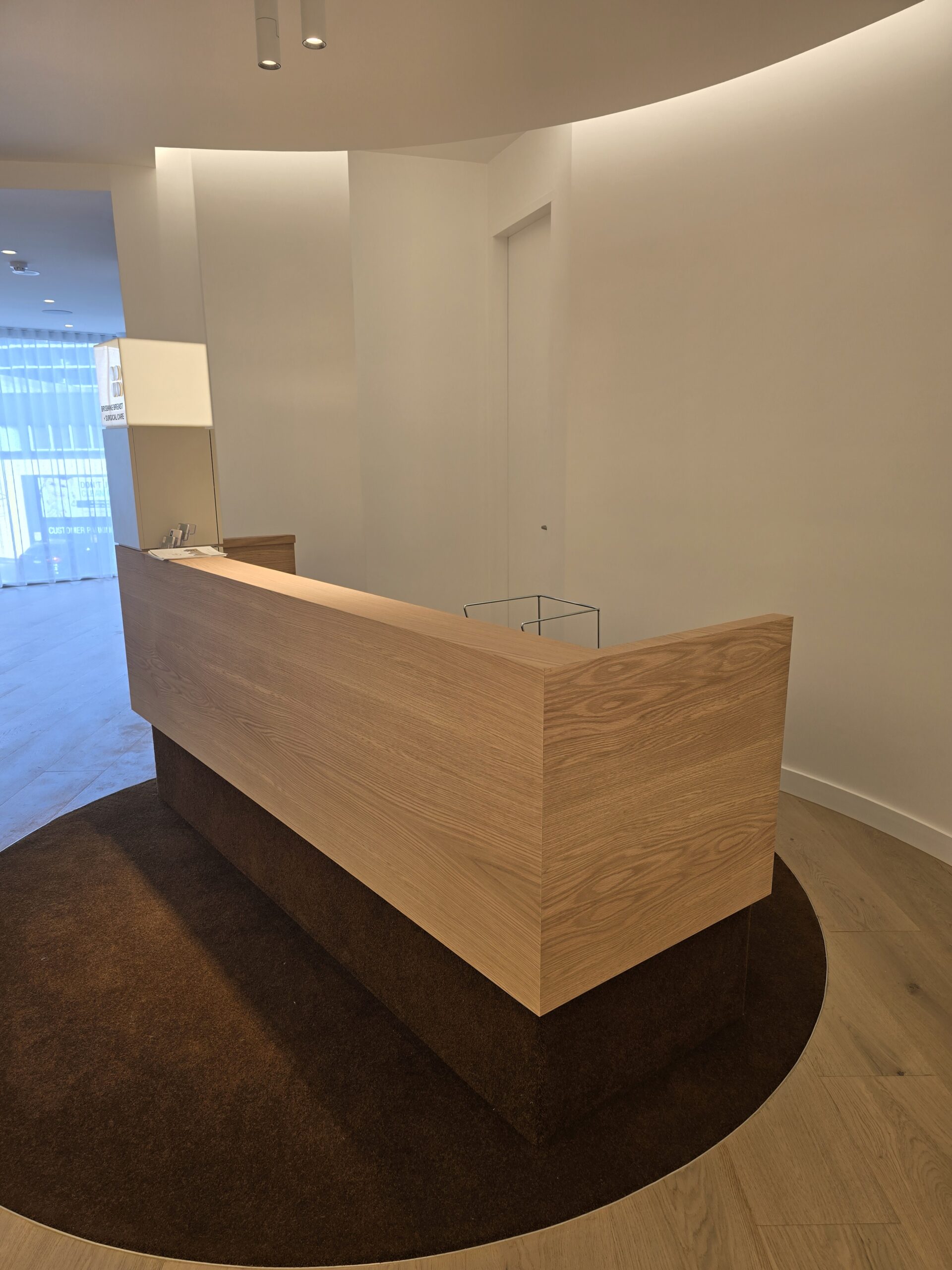 Circular lounge with curved leather banquette seating