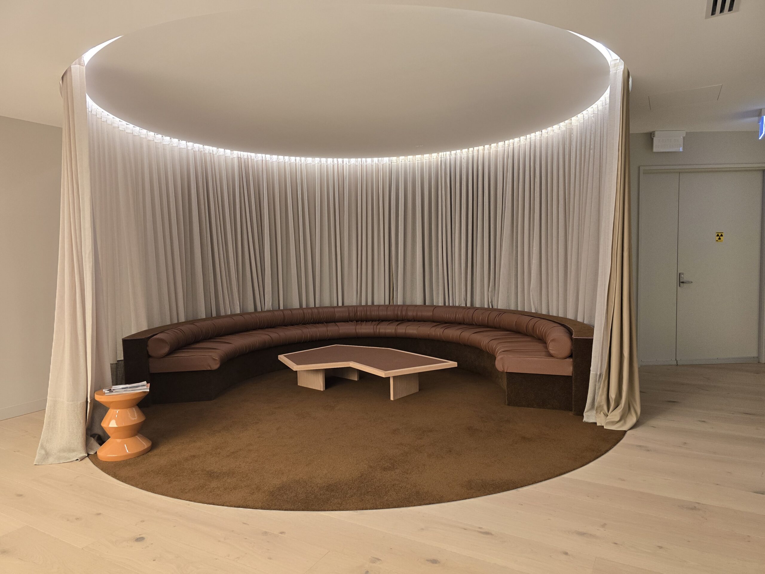 Curved upholstered banquette seating