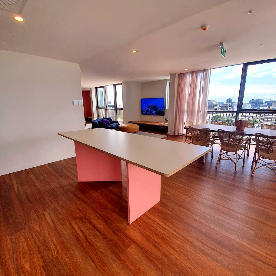 Modern living area with warm tones and custom joinery by KIS Joinery